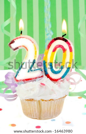 اروع تشكيلة لمحبي الكاب كيك Stock-photo-twentyeth-birthday-cupcake-with-white-frosting-and-green-decorative-background-16463980