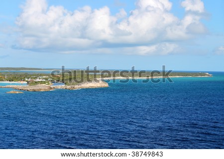 The island of Half Moon Cay in the Bahamas with beautiful turquoise blue waters