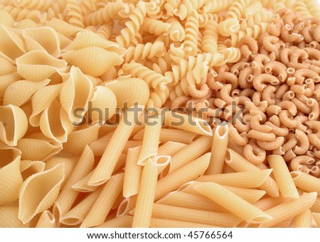 Variety of whole grain pasta, like whole wheat macaroni