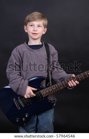 Boy Holding Guitar