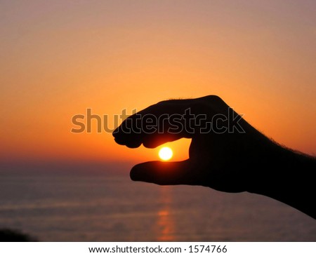 hand shadow on sunset