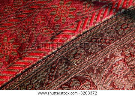 red and brown embroidery cloth texture