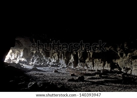 Light spilling in to a lava tube cave from the entrance