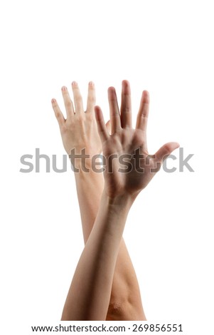 Hands lifted up in the air isolated on white background. Human hands raised up.