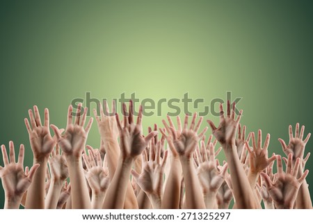 Many people\'s hands up isolated on gradient green background. Various hands lifted up in the air. Clipping path. Copy space.