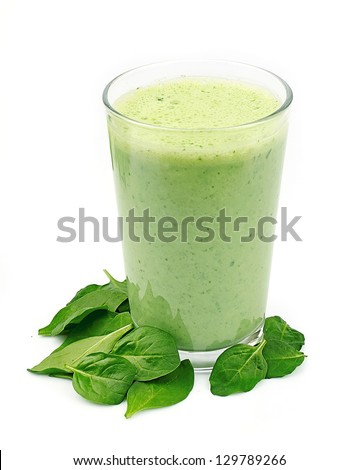 Vegetable cocktail Spinach smoothie close up on white Vegetable cocktail Spinach smoothie close up on white