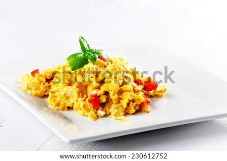 scrambled eggs on white plate