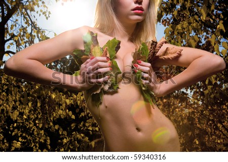 a girl with yellow leaves