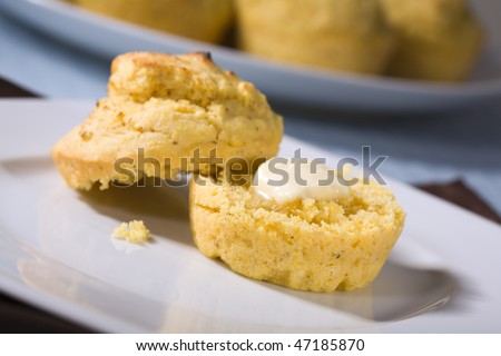 Vegan Corn Muffins made with corn meal and soy milk and topped with non-dairy vegan buttery spread