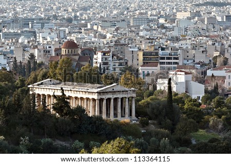 Ancient Greek temple and Athens city high view