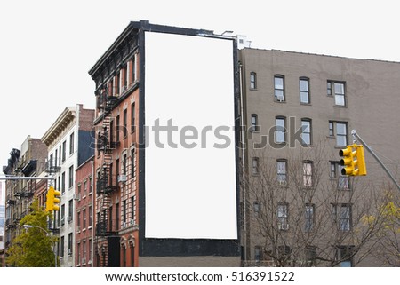 Blank billboard on building in urban area.