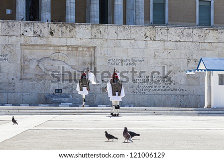 ATHENS,GREECE - DEC 2 :The Evzones  - historical elite unit of the Greek Army that guards the Greek Tomb of the Unknown Soldier and the Presidential Mansion,December 2, 2012 in Athens,Greece