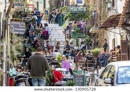Athens,Greece - Mar 09 : The Touristic Season Is Opening And Tourists Start Visiting The Famous Plaka Area Under Acropolis, March 09, 2013 In Athens,Greece