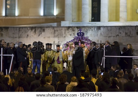 ATHENS,GREECE - APR 18 :Good Friday epitaph procession in Athens,the Epitaph is carried out from the church and the streets are full with Athenians,carrying candles ,April 18, 2014 in Athens,Greece