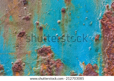 painted metal with rust background