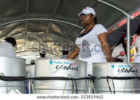 PORT OF SPAIN, TRINIDAD - February 17: A bass pan player performs in the steel band -Republic Bank Exodus- on carnival Tuesday in Trinidad, February 17, 2015 in of Port of Spain, Trinidad.