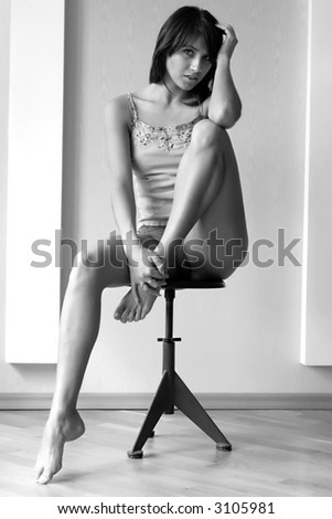 Woman sit on the chair.