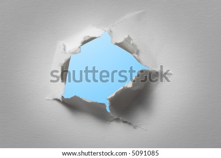 hole in white paper