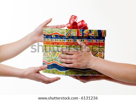 female hands giving a present