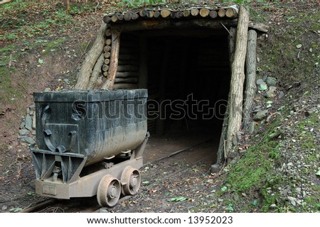 Old mine cart in the open air at the entrance of the mine.