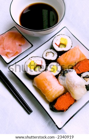 Sushi meal with maki-suhi, unagi-sushi, sushi with caviar of flying fish