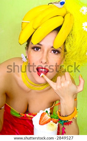 Banana lady eating a cream strawberry cocktail