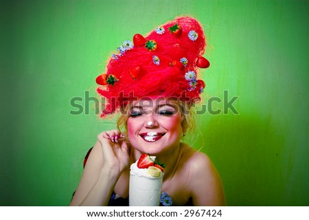 Strawberry girl eating whipped cream with fun