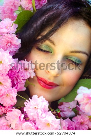 pink flowers - Page 3 Stock-photo-beautiful-face-among-pink-flowers-of-cherry-52904374