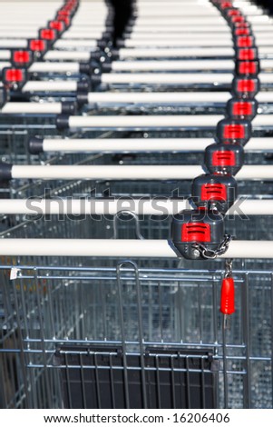 Rows of shopping trolleys with pay system