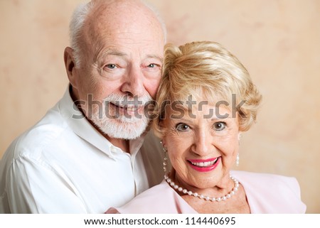 Closeup portrait of beautiful senior husband and wife.