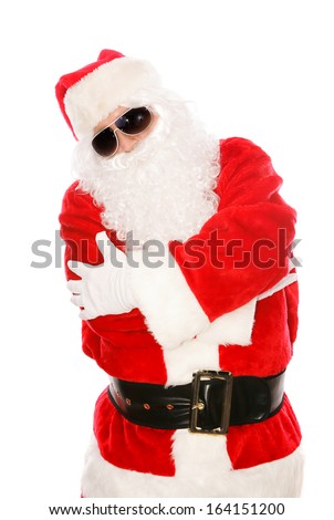 Cool Santa Claus in hip-hop pose with dark sunglasses on.  Isolated on white.