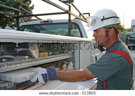 Electrician with service truck.