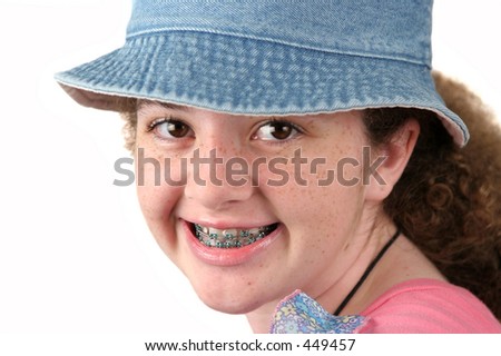 stock photo A closeup of a cute teenaged girl with braces
