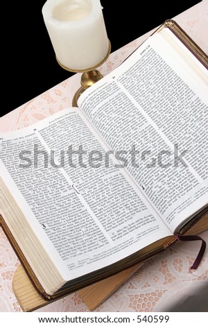 A bible open to John, vertical view.  Clipping path included