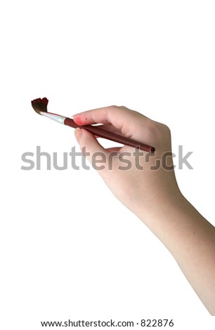 hand holding paintbrush