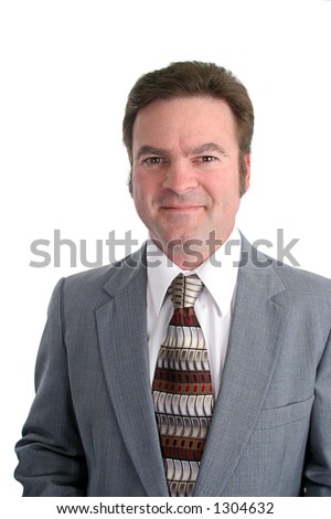 A vertical portrait of an attractive businessman in his forties.  Isolated.