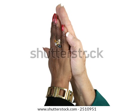 Closeup of business women's hands giving a high five.  Isolated with clipping path.