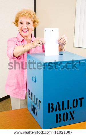 Senior woman casting her vote in the election.