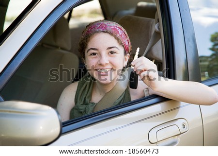 stock photo Cute teen girl excited to have the car keys
