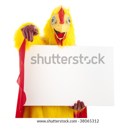 Man in a chicken suit holds a blank sign and points at the camera.  Isolated on white.