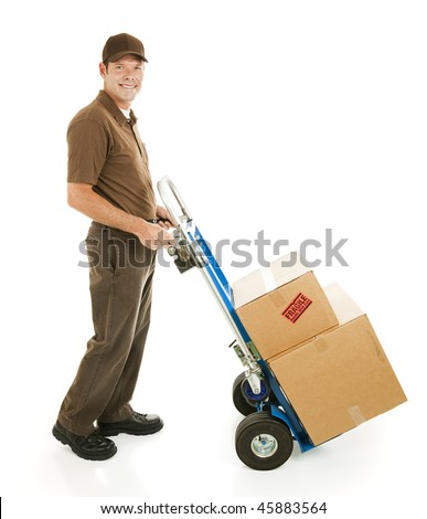Profile view of a handsome delivery man or mover carrying boxes on a hand cart.