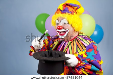 Happy birthday clown doing magic tricks with a top hat and wand.