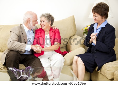 Happy senior couple benefits from marriage counseling.