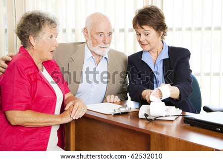 Seniors get upsetting news from their financial consultant.