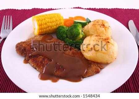 Steak and vegetable dinner setting