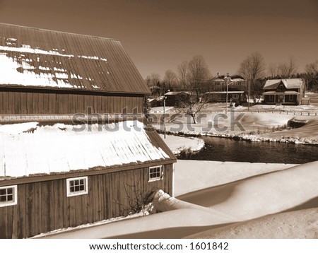 A barn on a winter day - sepia