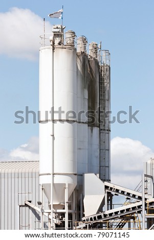 A group of processing silos of a concrete factory
