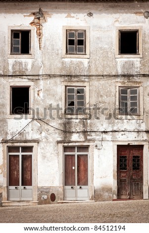 Front of abandoned building with two floors