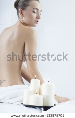 beautiful woman in a medical beauty center on massage therapy