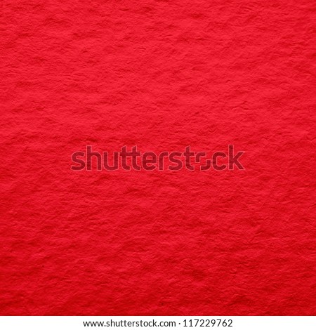 Red paper as a texture or background. To use the website as a background.